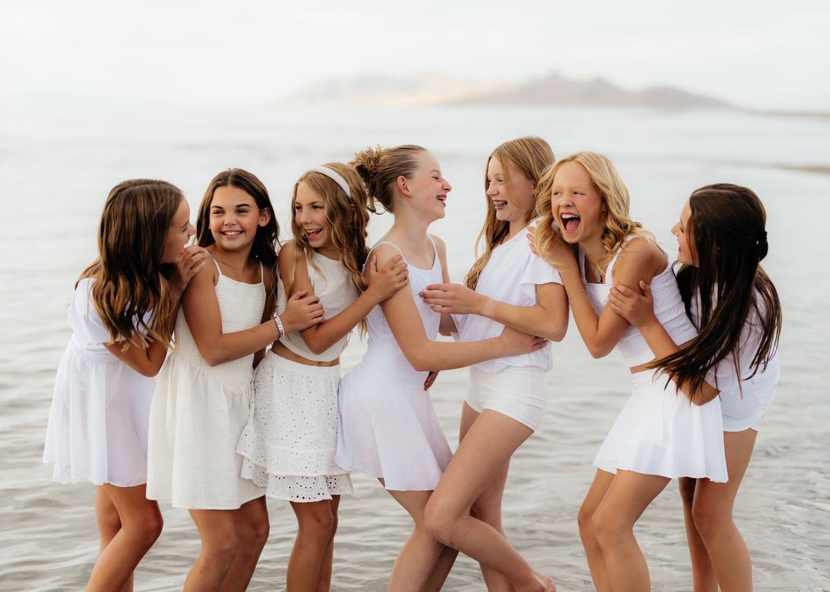 A group of Anchor dancers laughing together