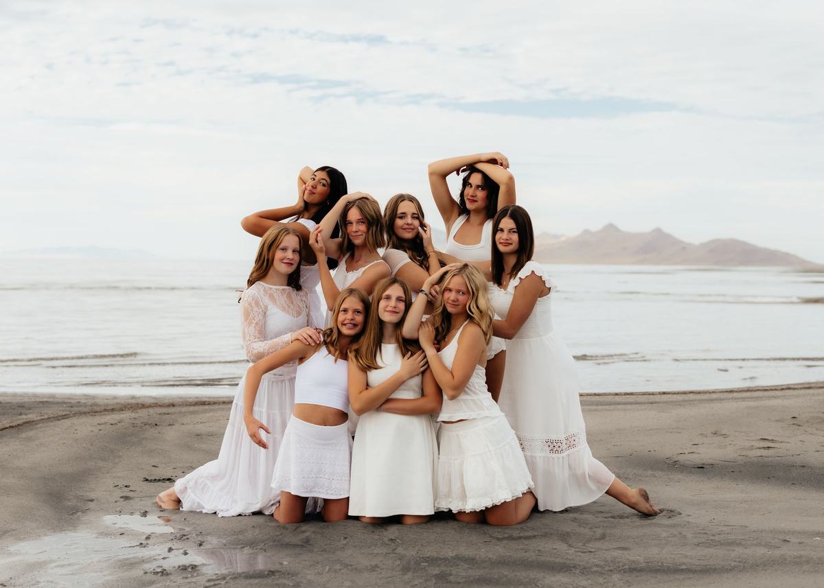 Dancers of different ages posing together