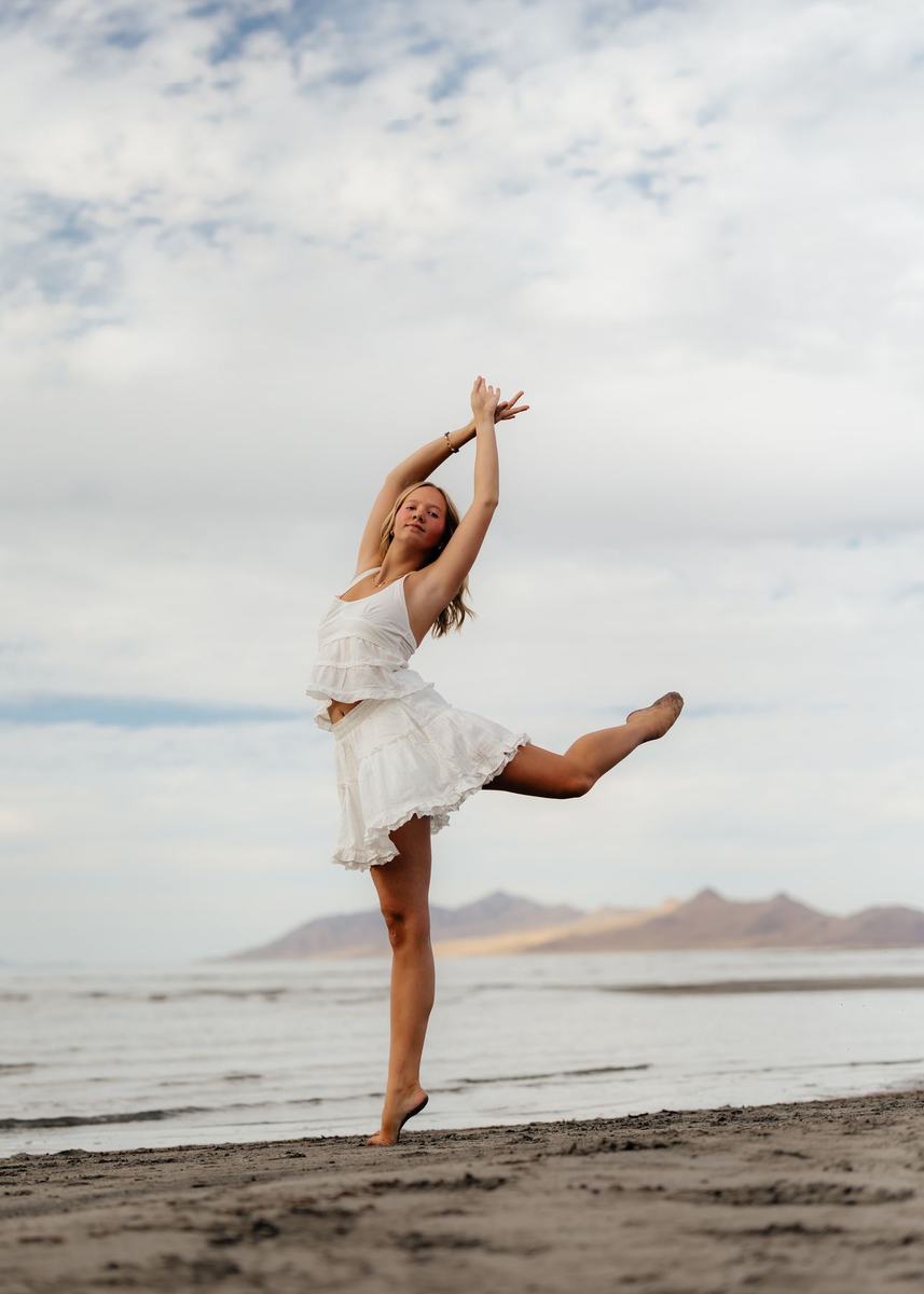 An Anchor dancer balancing in an arabesque